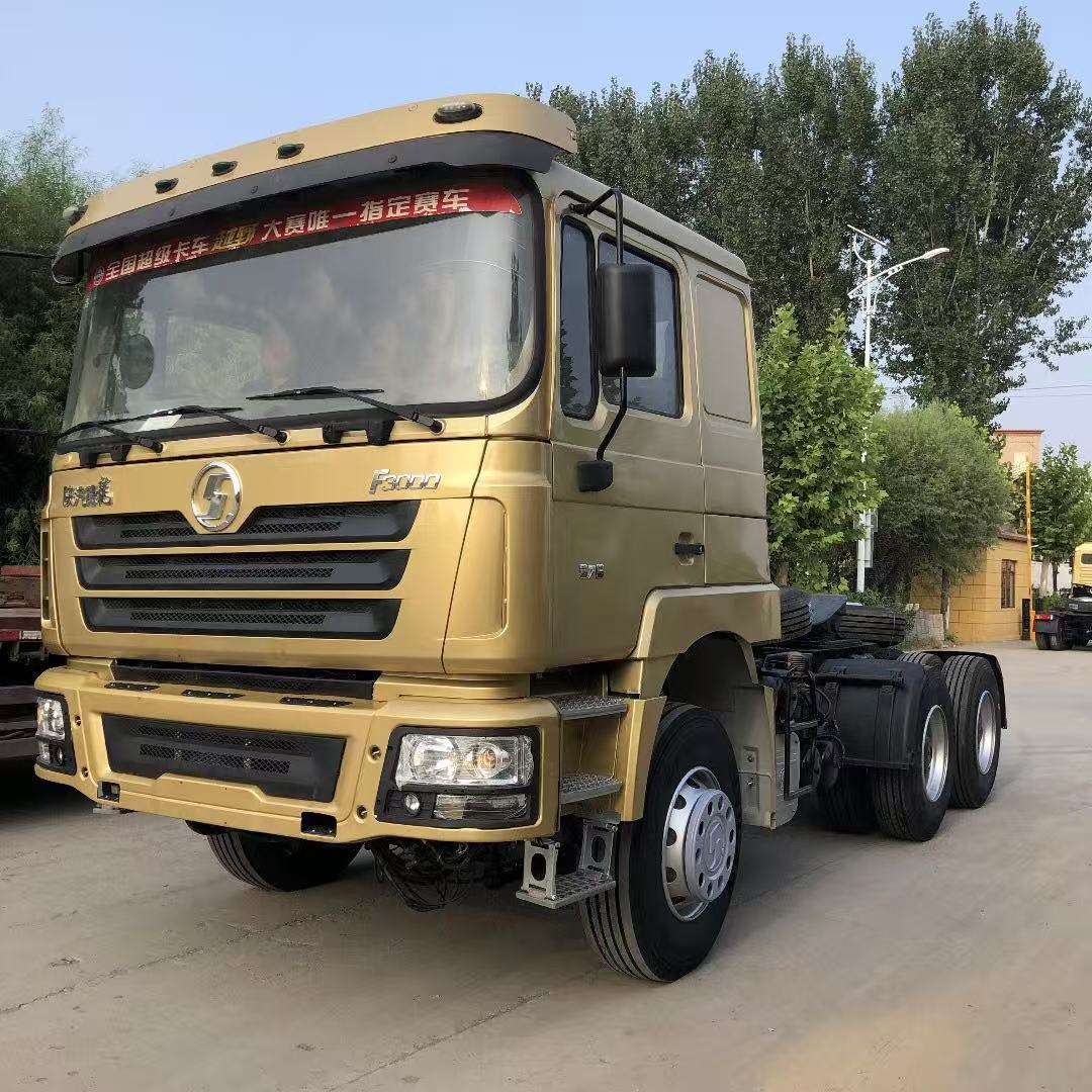 Yellow Shacman F3000 6x4 tractor truck side view
