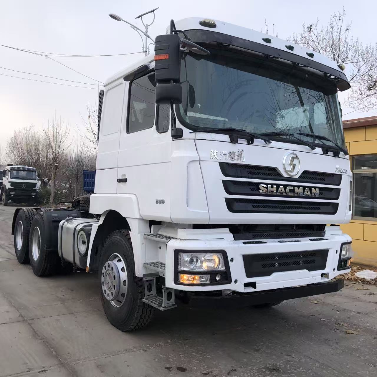 White Shacman F3000 6x4 Prime Mover side angle view